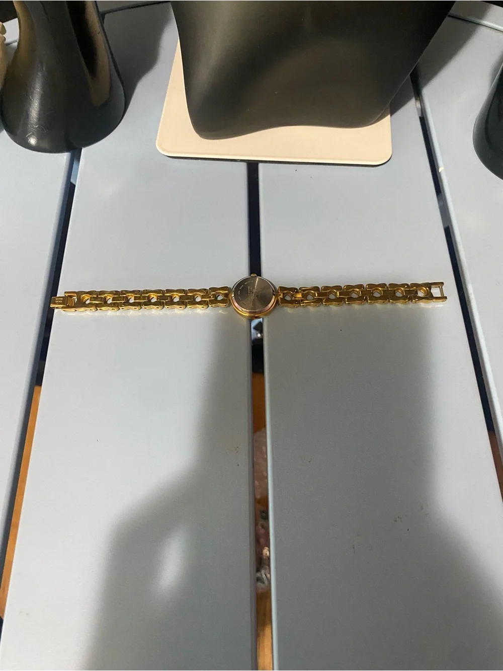 Decan De La Renta gold tone designer watch
